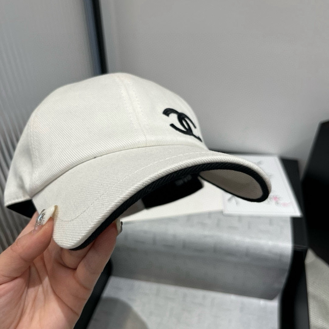 CHANEL BASEBALL HAT IN WHITE WITH BLACK TRIM 673994