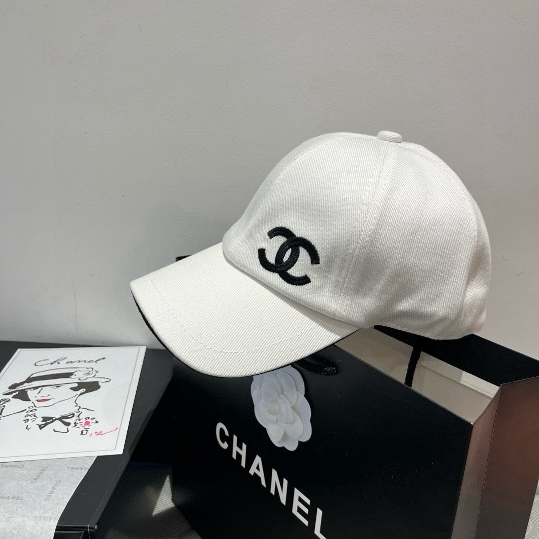 CHANEL BASEBALL HAT IN WHITE WITH BLACK TRIM 673994