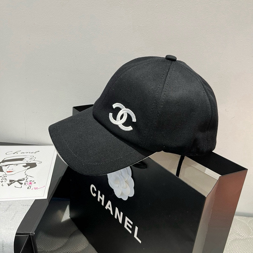 CHANEL BASEBALL HAT IN BLACK WITH WHITE TRIM 673995