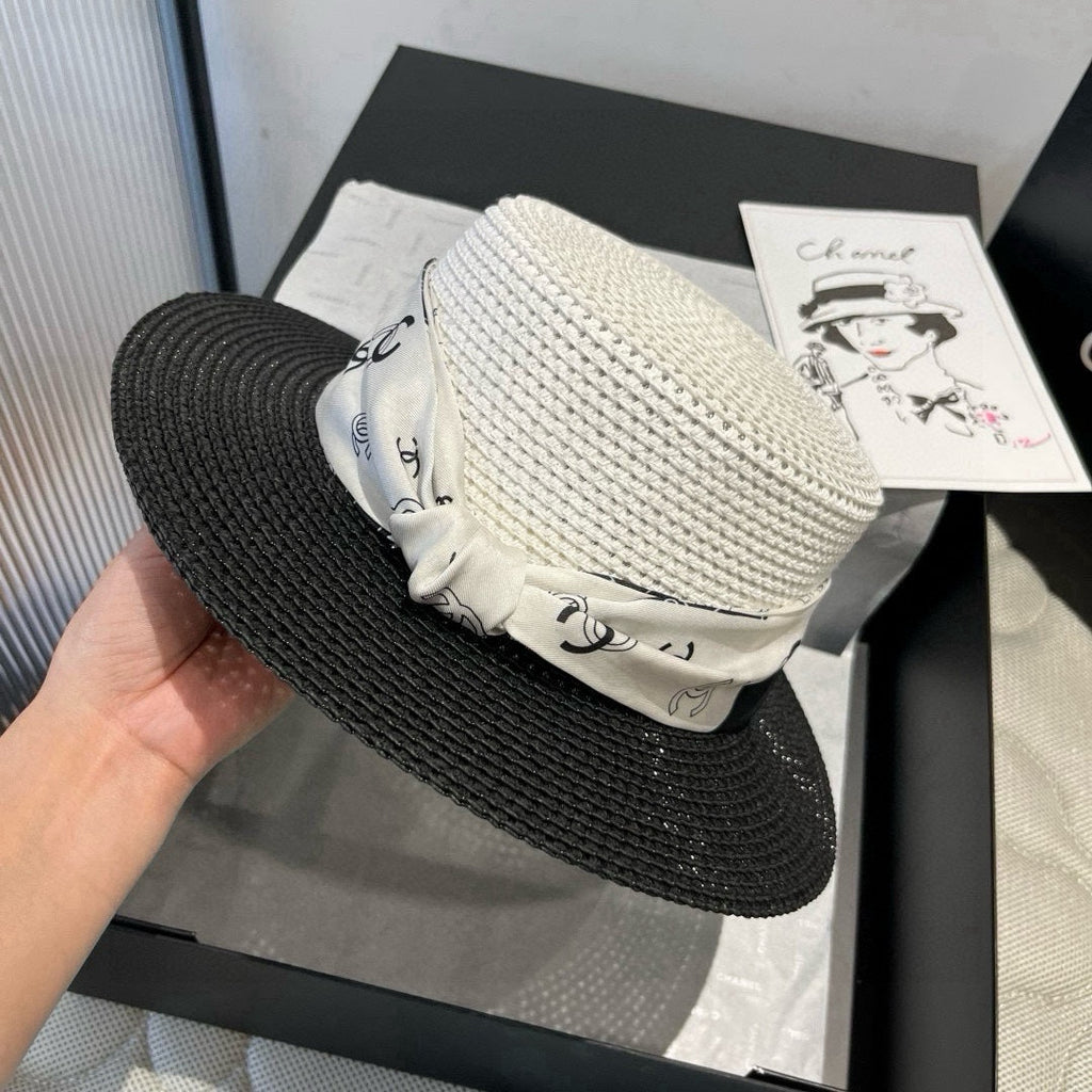 CHANEL FLAT STRAW HAT BLACK AND WHITE 673935