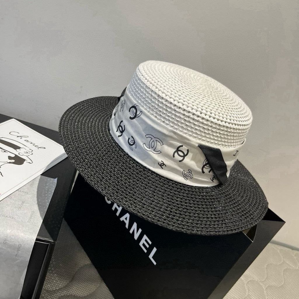 CHANEL FLAT STRAW HAT BLACK AND WHITE 673935