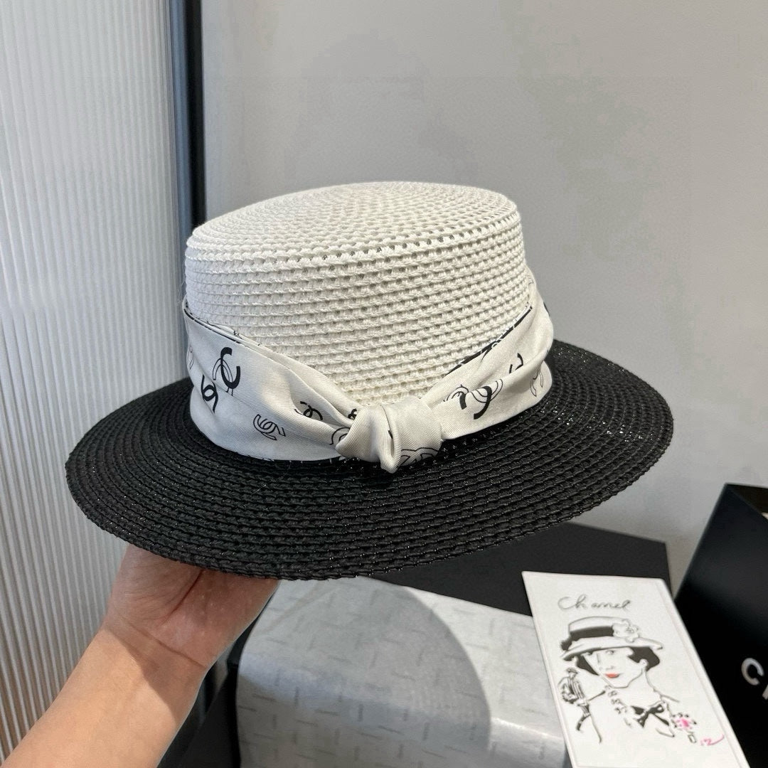 CHANEL FLAT STRAW HAT BLACK AND WHITE 673935