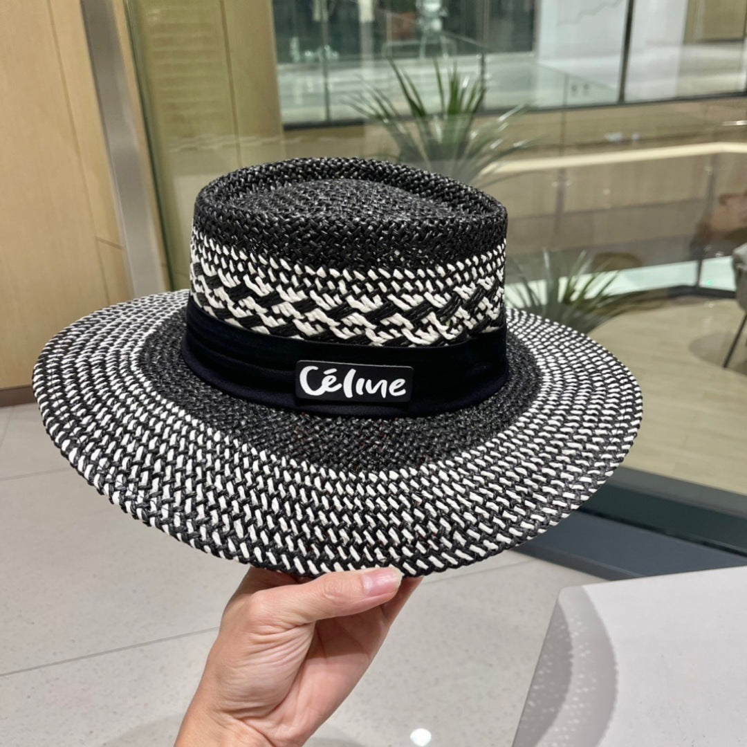 CELINE WIDE BRIM HAT MODEL 652048 IN BLACK AND WHITE WOVEN STRAW