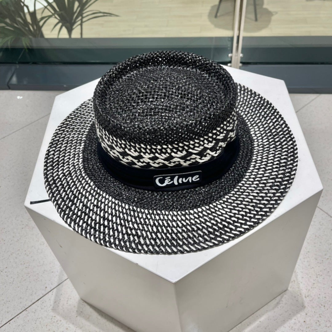 CELINE WIDE BRIM HAT MODEL 652048 IN BLACK AND WHITE WOVEN STRAW