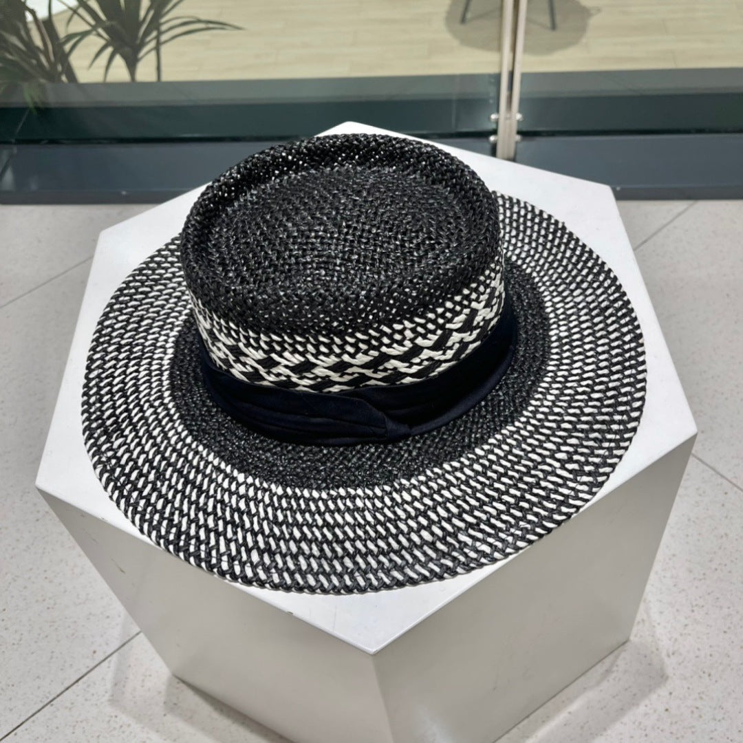 CELINE WIDE BRIM HAT MODEL 652048 IN BLACK AND WHITE WOVEN STRAW