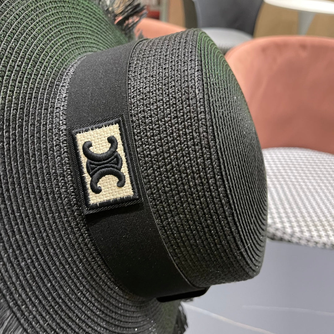 CELINE WIDE BRIM HAT MODEL 651883 IN BLACK WOVEN STRAW
