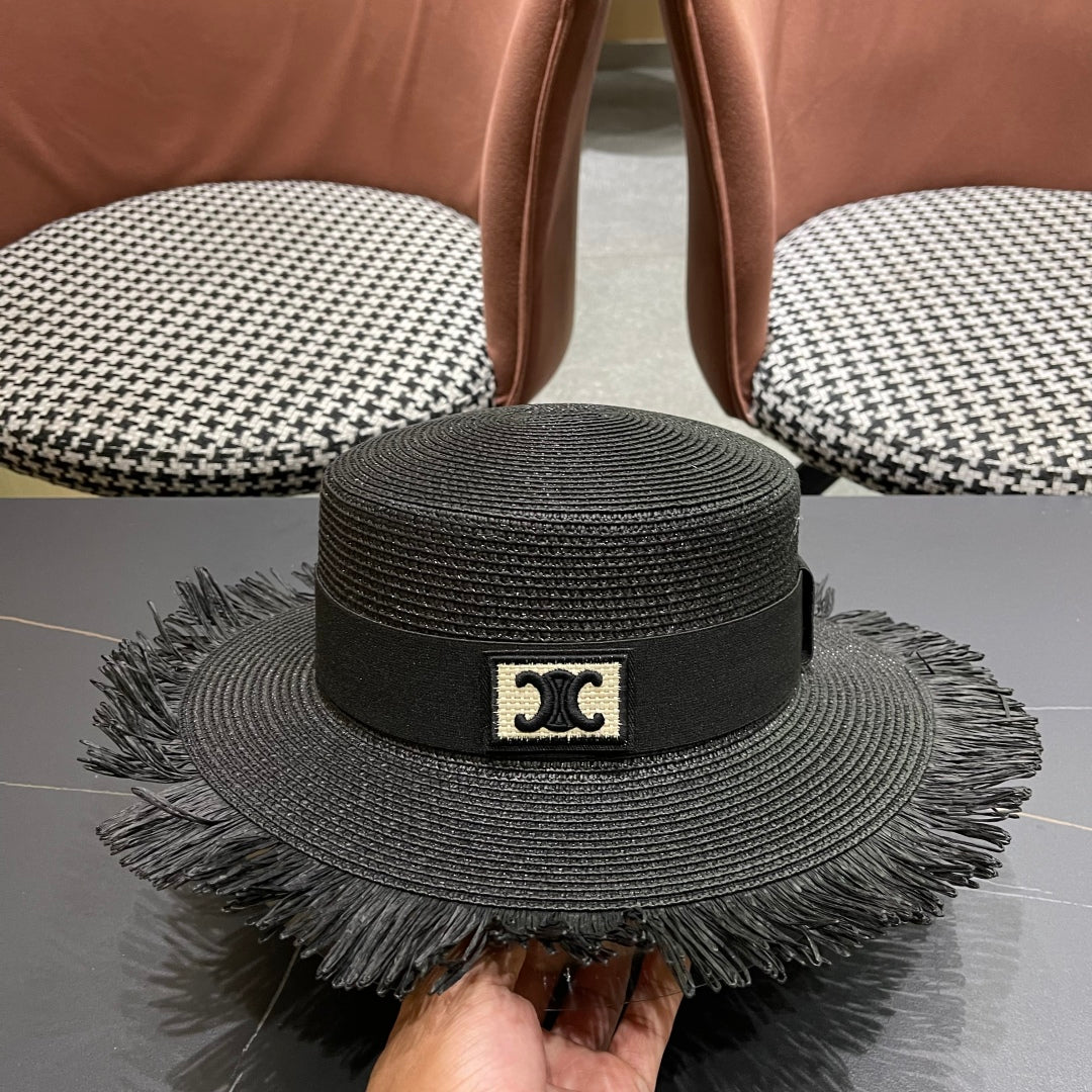 CELINE WIDE BRIM HAT MODEL 651883 IN BLACK WOVEN STRAW