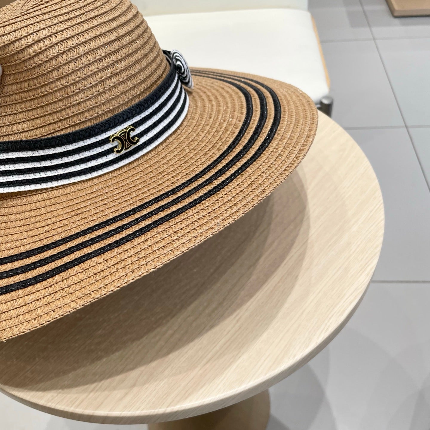 CELINE WIDE BRIM HAT MODEL 650410 IN BROWN WITH BLACK STRIPES WOVEN STRAW