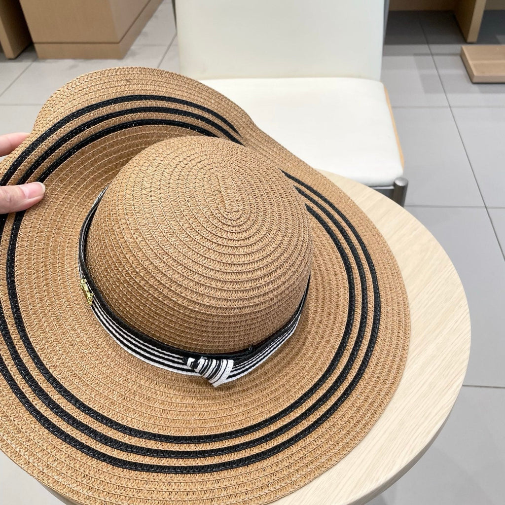 CELINE WIDE BRIM HAT MODEL 650410 IN BROWN WITH BLACK STRIPES WOVEN STRAW
