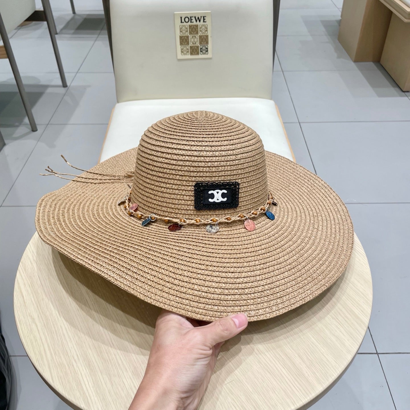 CELINE WIDE BRIM HAT MODEL 652183 IN NATURAL WOVEN STRAW