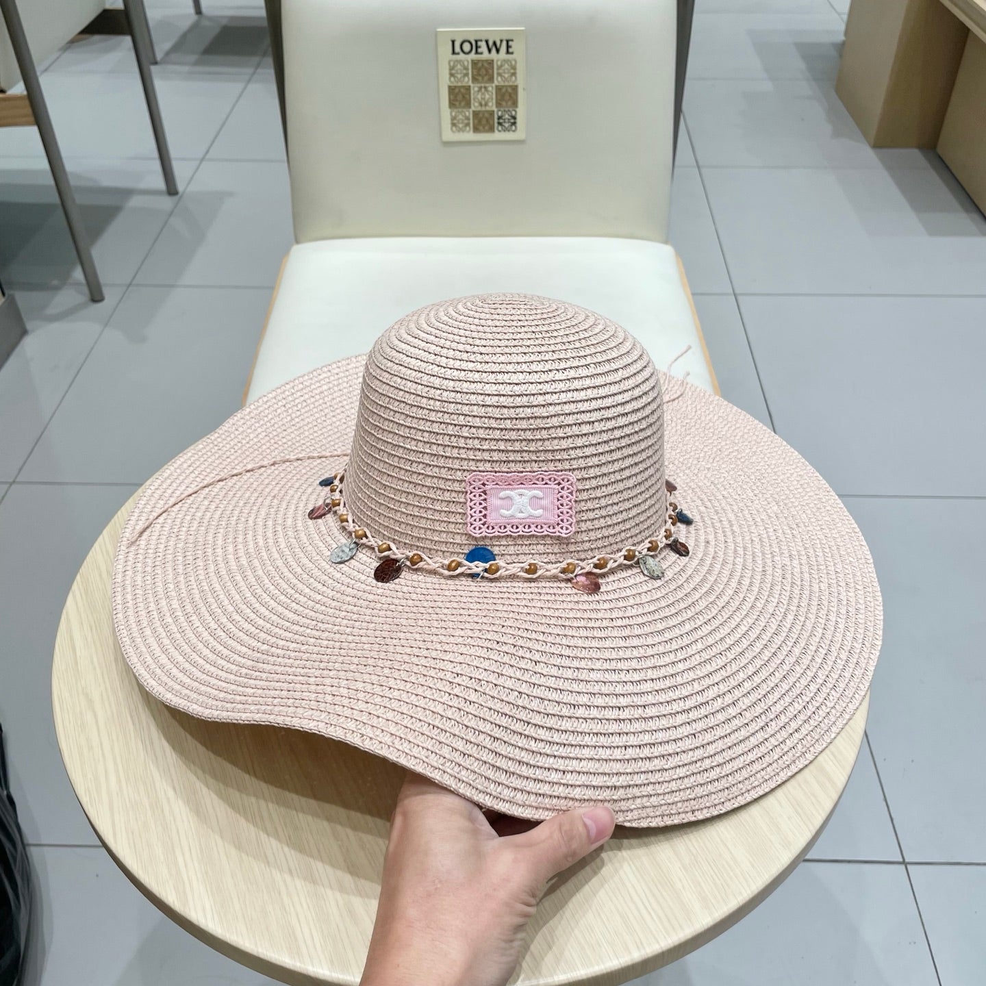 CELINE WIDE BRIM HAT MODEL 652184 IN LIGHT PINK WOVEN STRAW