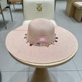 CELINE WIDE BRIM HAT MODEL 652184 IN LIGHT PINK WOVEN STRAW