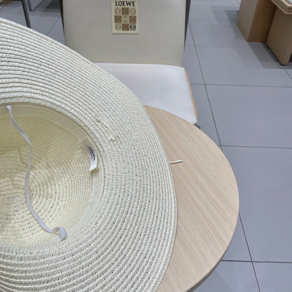 CELINE WIDE BRIM HAT MODEL 652186 IN WHITE WOVEN STRAW