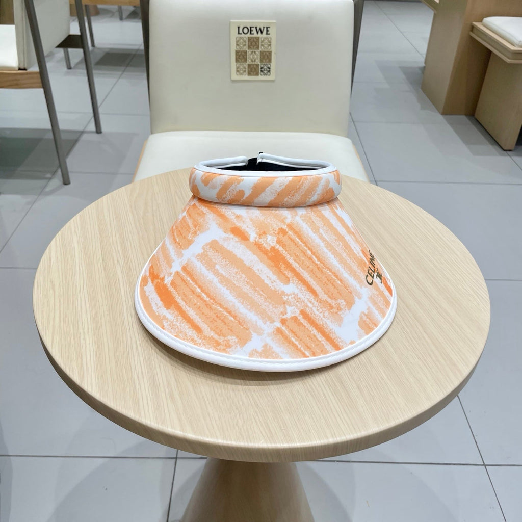 CELINE VISOR HAT MODEL 652202 IN ORANGE AND WHITE FABRIC