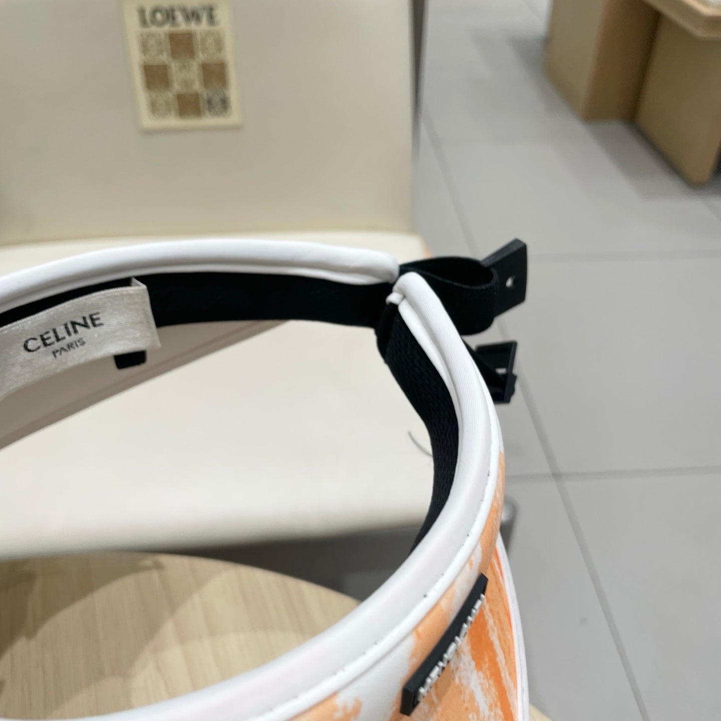 CELINE VISOR HAT MODEL 652202 IN ORANGE AND WHITE FABRIC