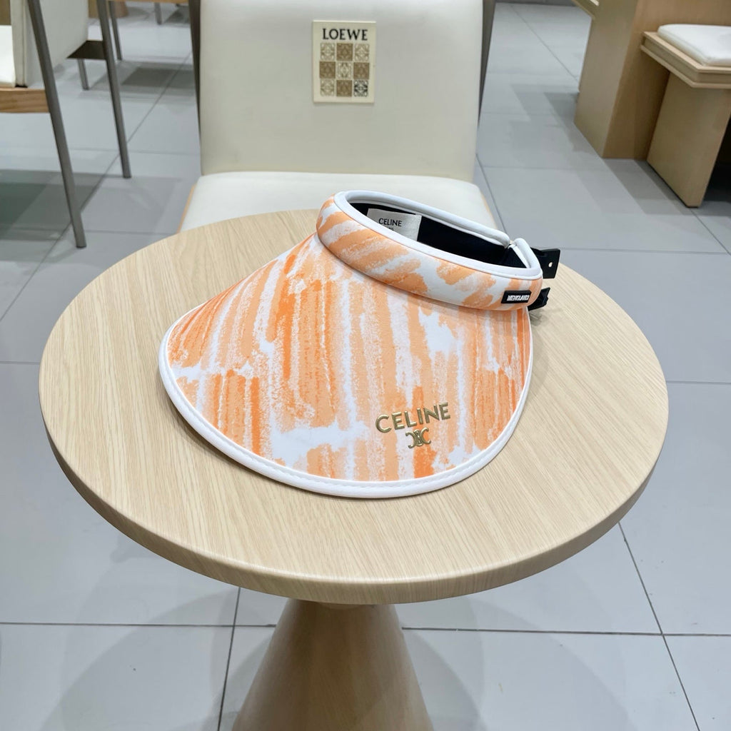 CELINE VISOR HAT MODEL 652202 IN ORANGE AND WHITE FABRIC