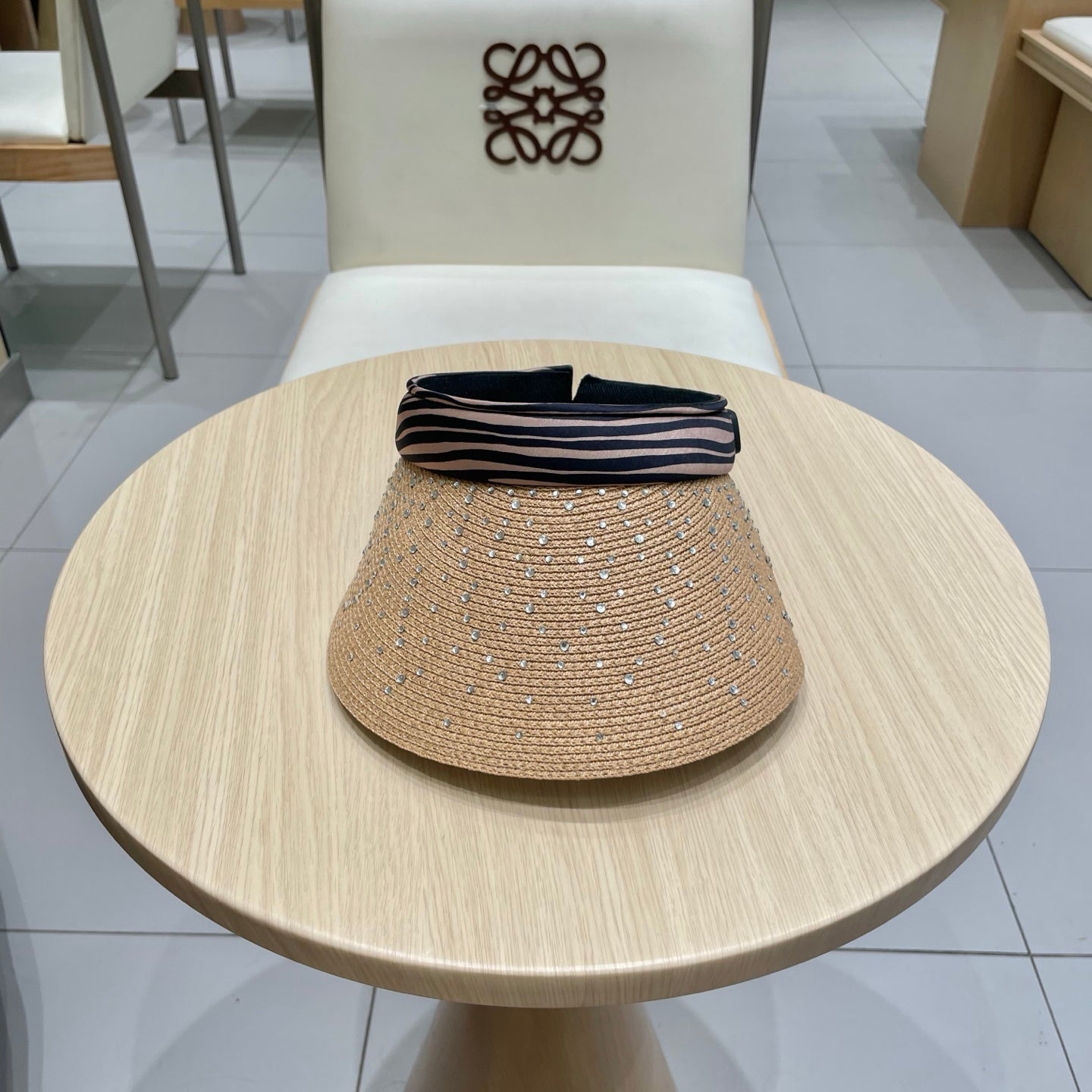 CELINE VISOR HAT MODEL 652214 IN NATURAL WOVEN STRAW