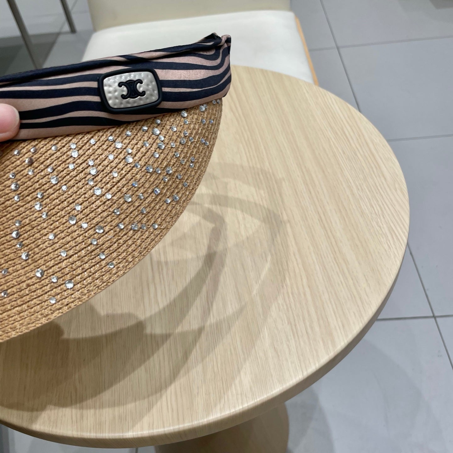 CELINE VISOR HAT MODEL 652214 IN NATURAL WOVEN STRAW