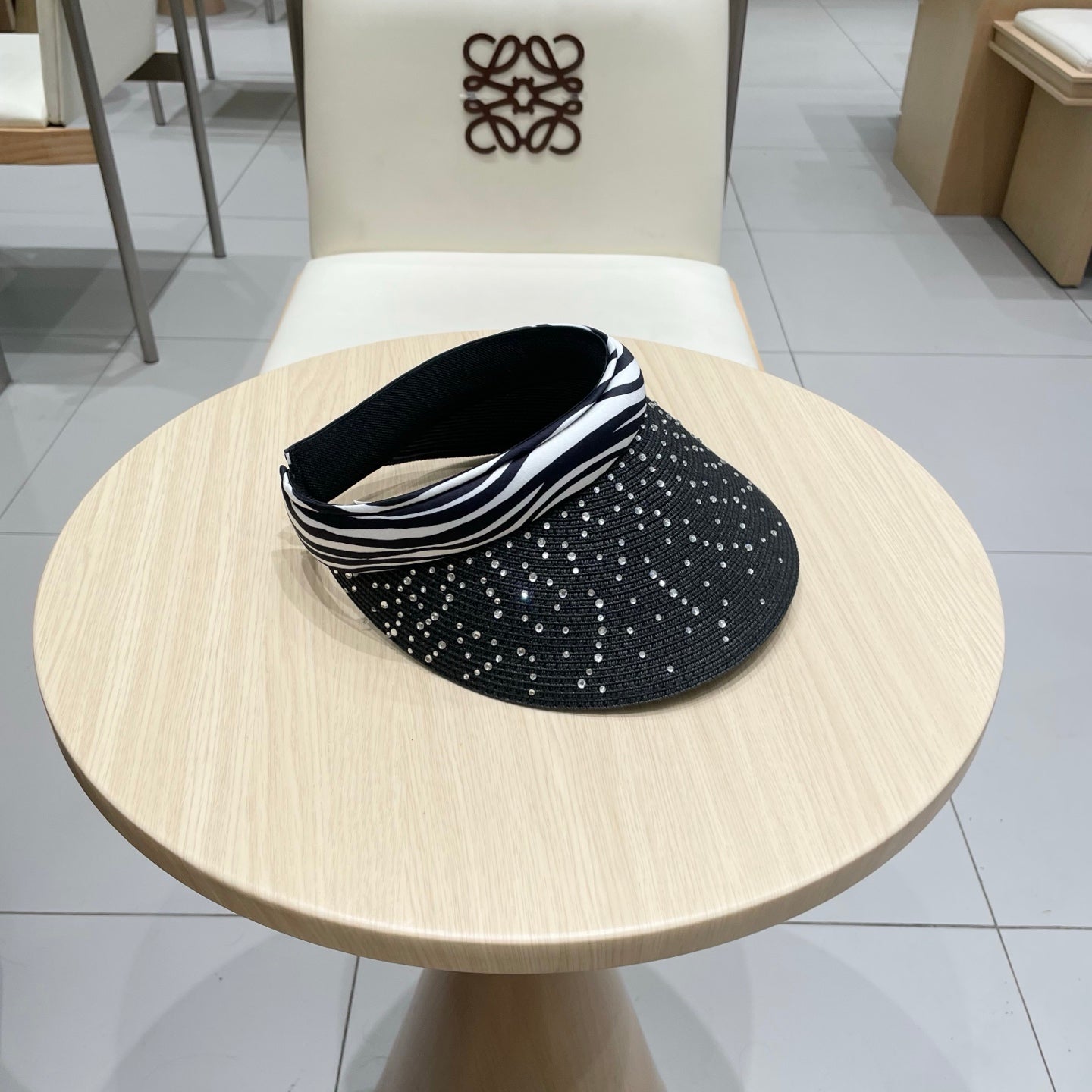 CELINE VISOR HAT MODEL 652215 IN BLACK WOVEN STRAW