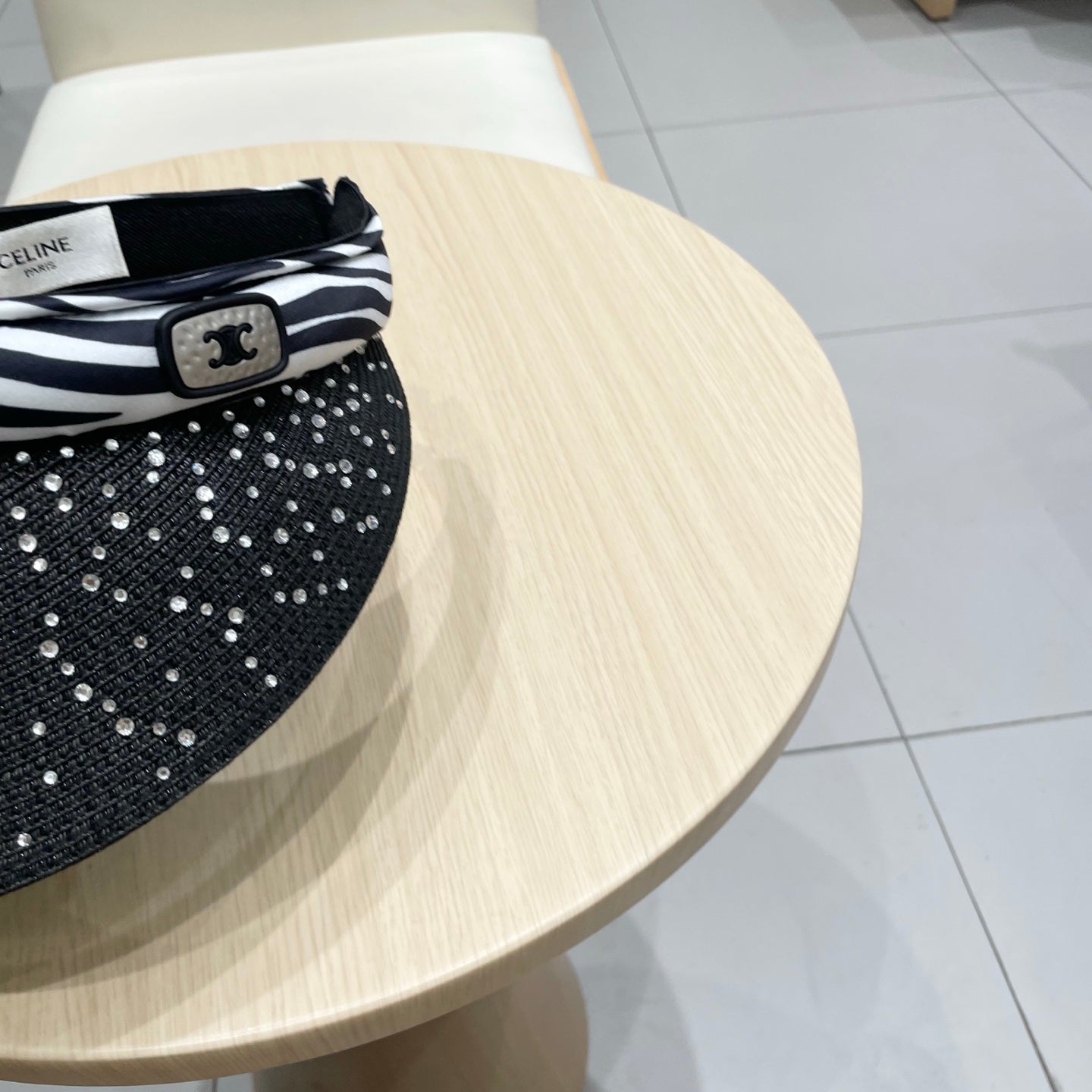 CELINE VISOR HAT MODEL 652215 IN BLACK WOVEN STRAW