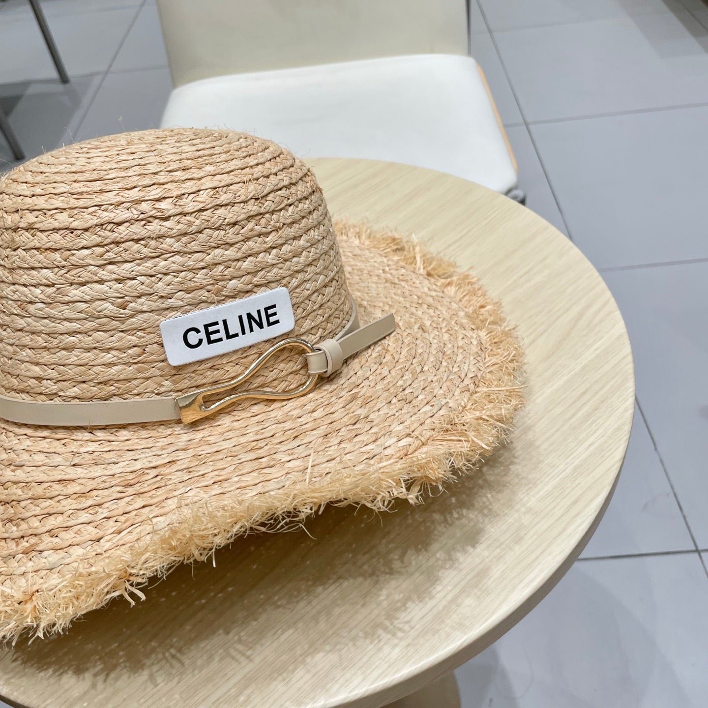 CELINE WIDE BRIM HAT MODEL 650421 IN NATURAL WITH BEIGE LEATHER STRAP RAFFIA STRAW