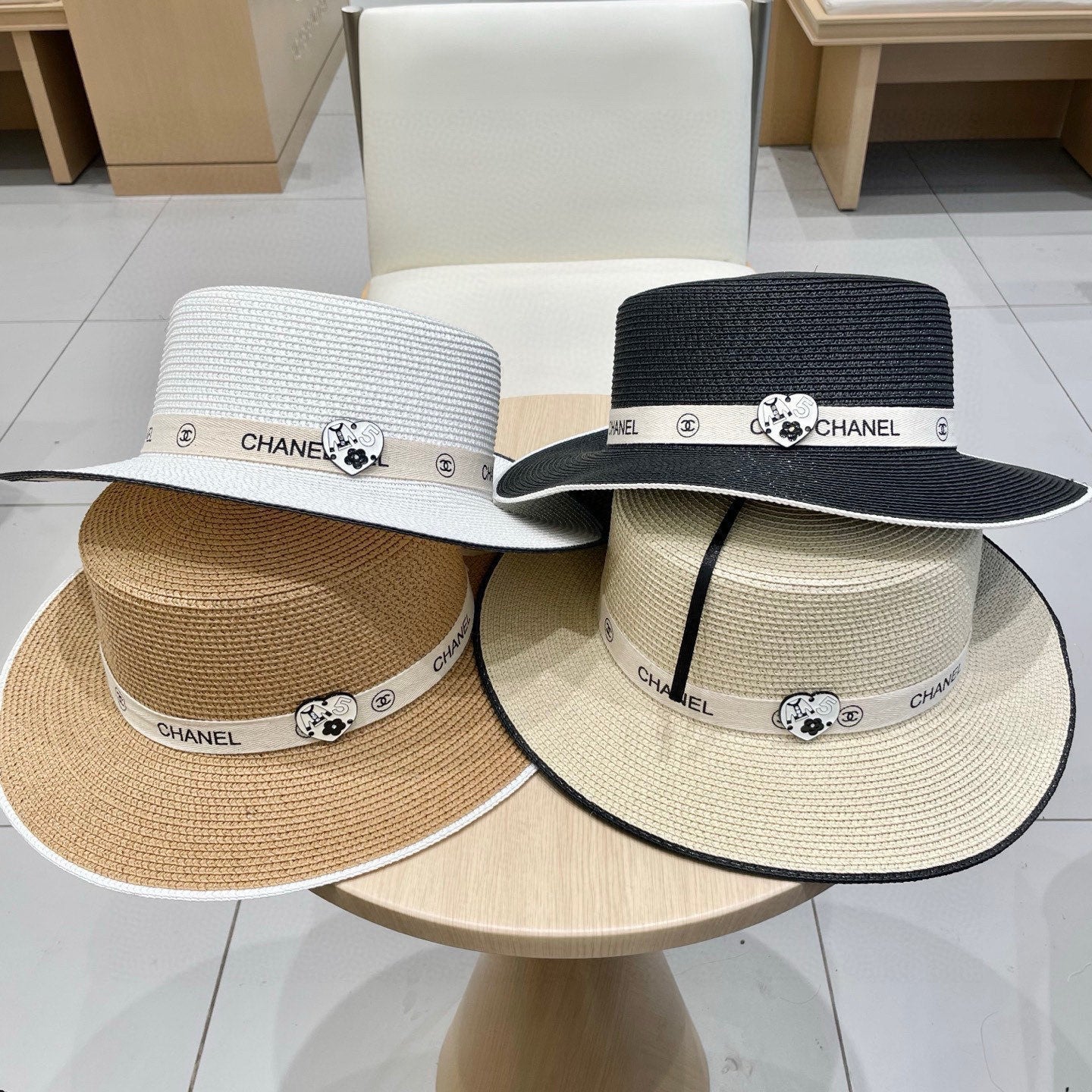 CHANEL FLAT STRAW HAT IVORY 672723